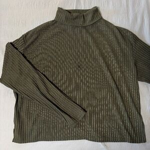 green turtleneck top